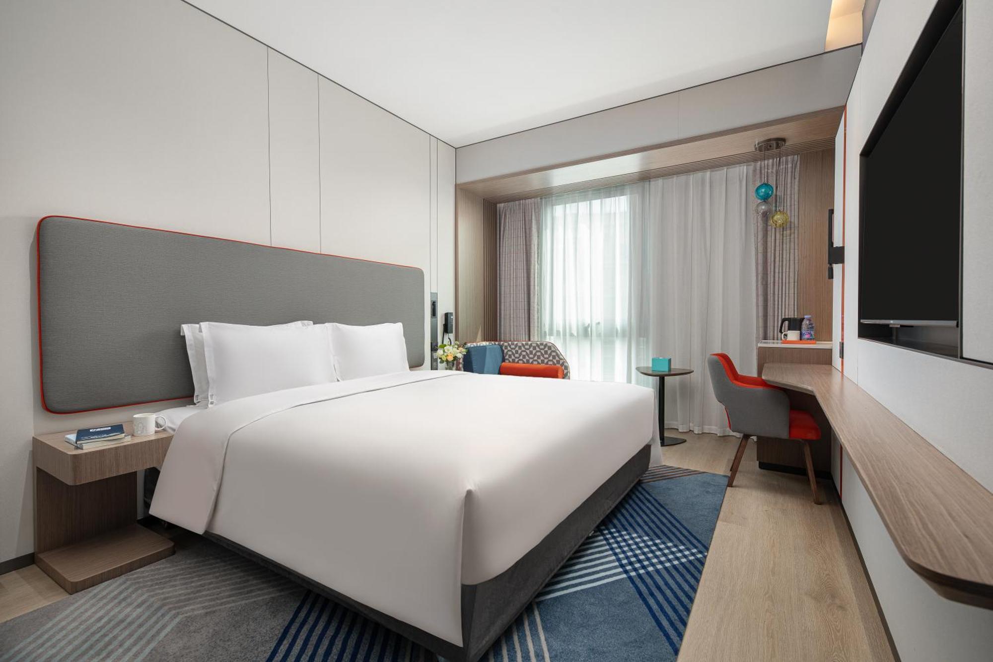 Holiday Inn Express Changfeng Park Шанхай Экстерьер фото