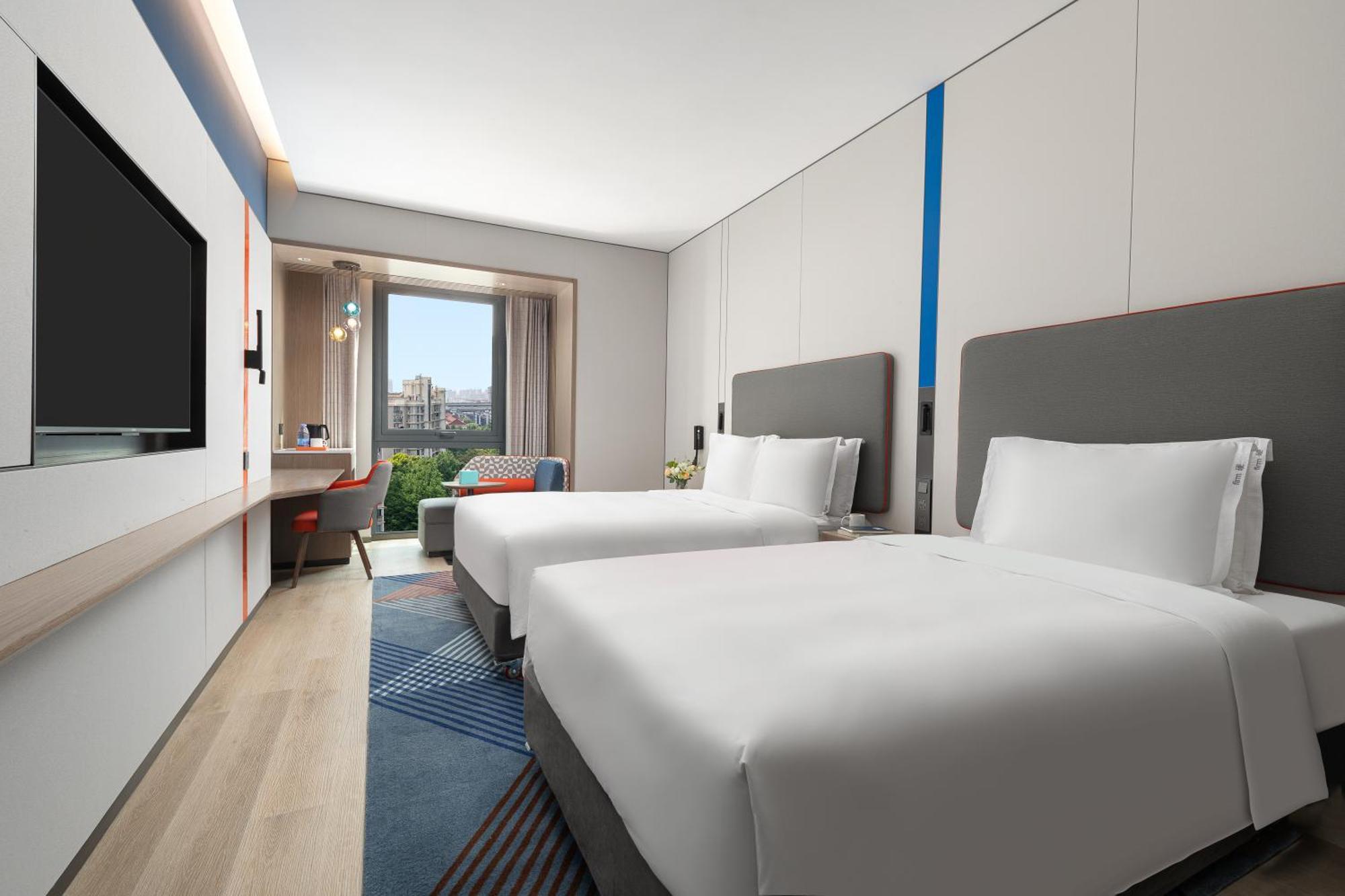 Holiday Inn Express Changfeng Park Шанхай Экстерьер фото