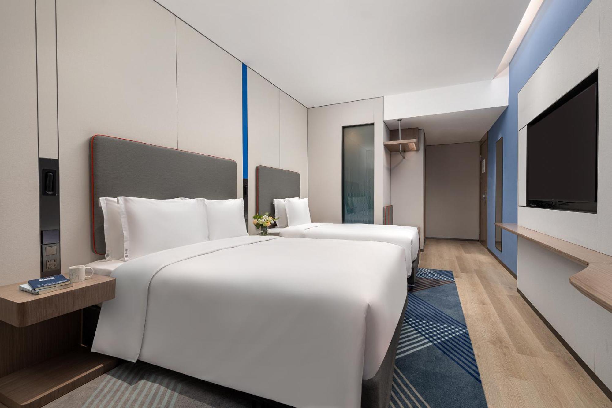 Holiday Inn Express Changfeng Park Шанхай Экстерьер фото